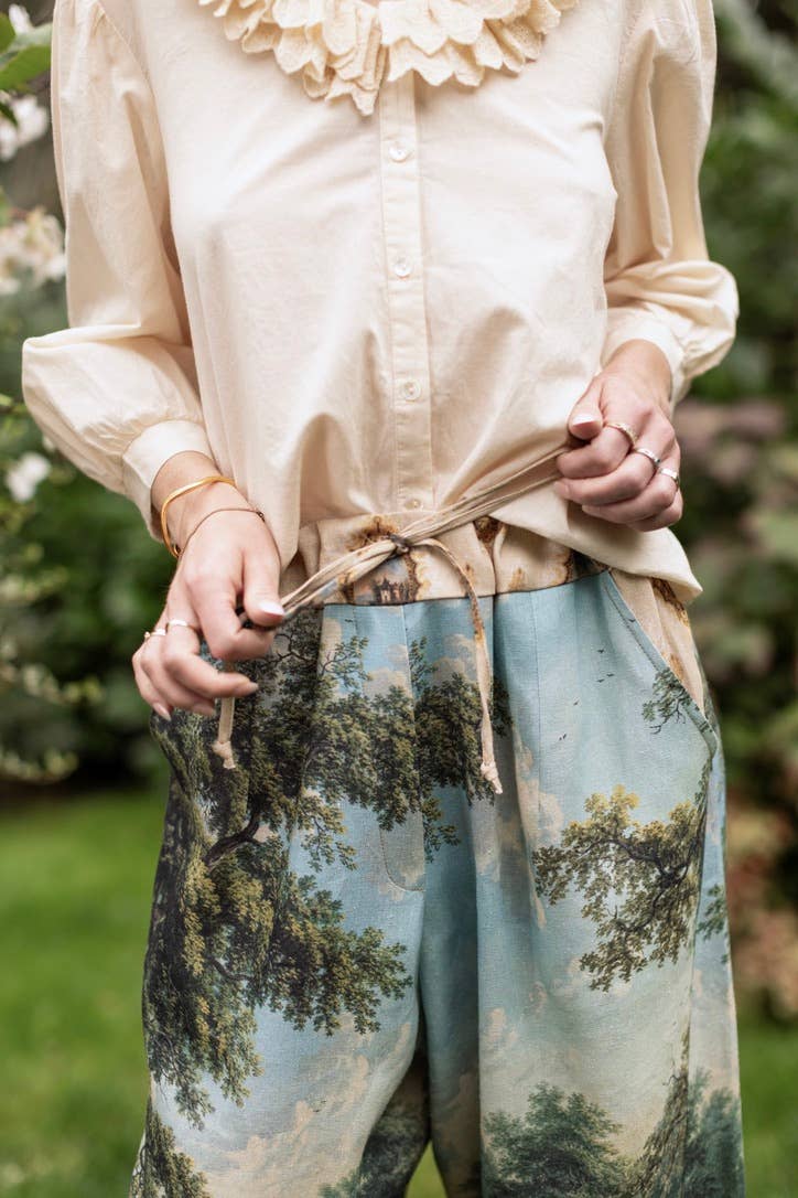 The Mythmaker Linen Crop Artist Pant w/ pastoral landscape